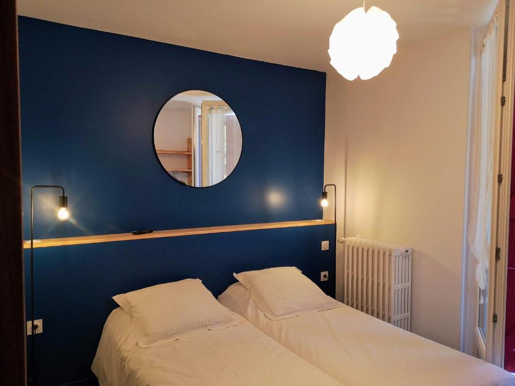 Postel nebo postele na pokoji v ubytování Le Relais d'Avajan