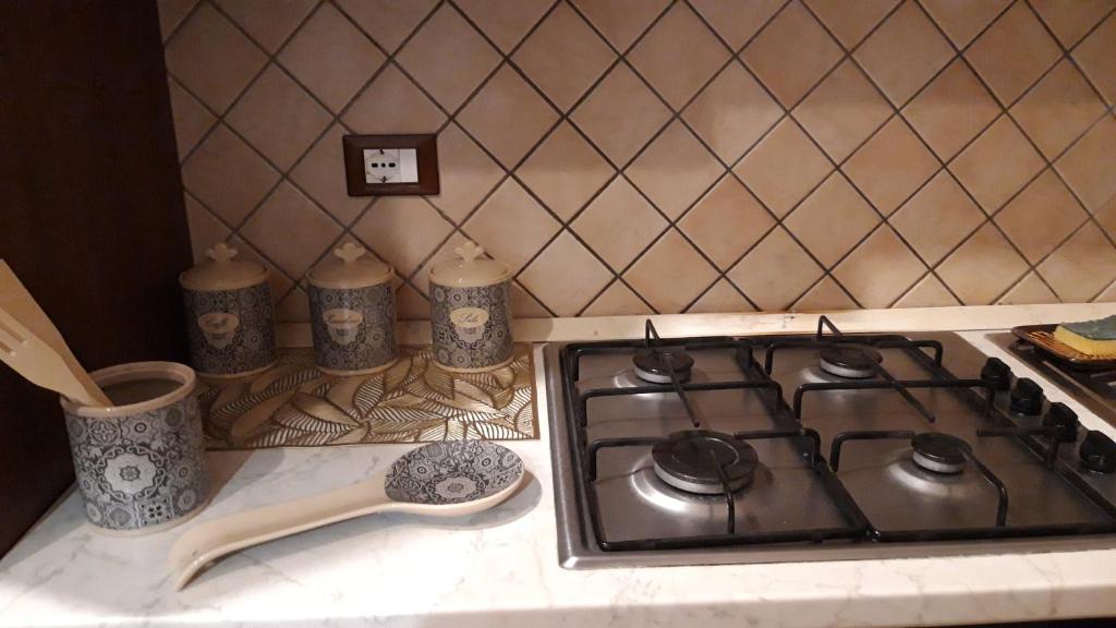 Kuchyň nebo kuchyňský kout v ubytování Casa 4 Archi