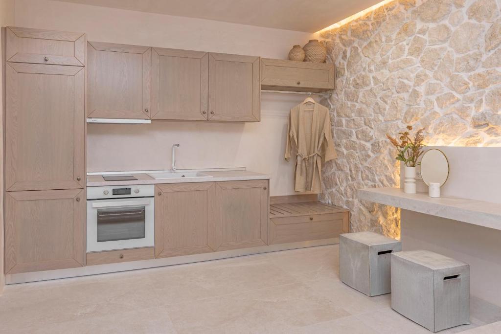 Kuchyň nebo kuchyňský kout v ubytování Milos Villas Complex