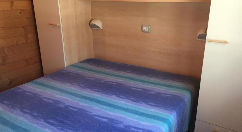 Postel nebo postele na pokoji v ubytování Camping Paradiso