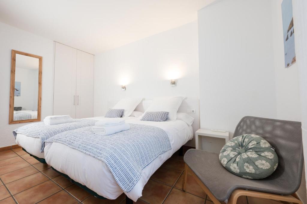 Postel nebo postele na pokoji v ubytování Hostal el Ranxo