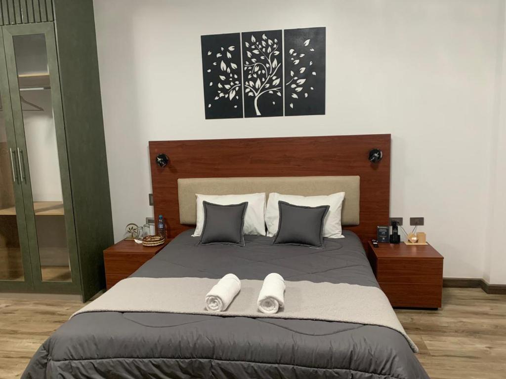Postel nebo postele na pokoji v ubytování Hotel Sacha Golden