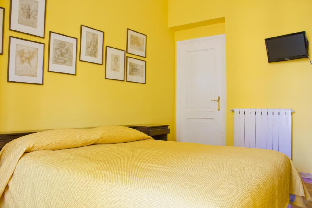 Postel nebo postele na pokoji v ubytování La Bertina