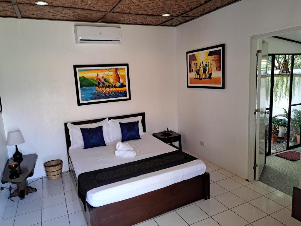 Postel nebo postele na pokoji v ubytování Palmera Palma Private 1-BR Bungalow #3