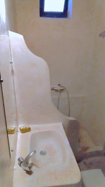 Koupelna v ubytování Riad Le Grand Large