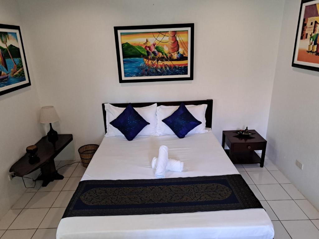 Postel nebo postele na pokoji v ubytování Palmera Palma Private 1-BR Bungalow #3