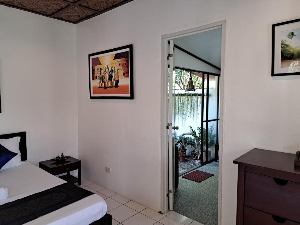Postel nebo postele na pokoji v ubytování Palmera Palma Private 1-BR Bungalow #3