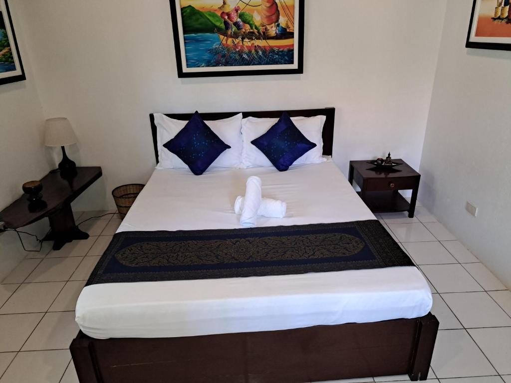 Postel nebo postele na pokoji v ubytování Palmera Palma Private 1-BR Bungalow #3