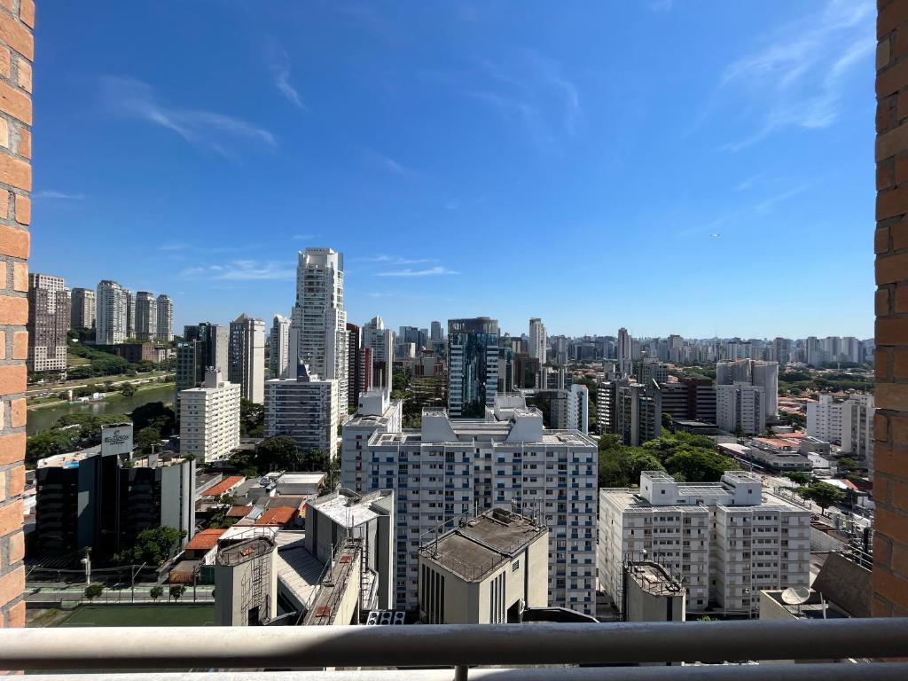 a view of a city skyline with tall buildings at NYC Berrini Duplex Com Vista Deslumbrante!! in Sao Paulo