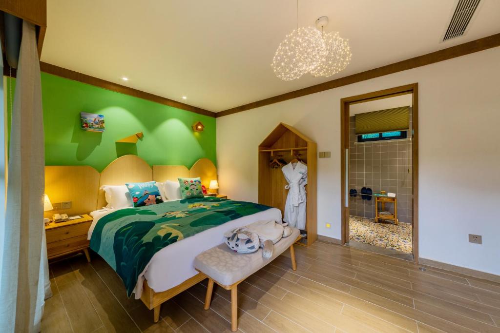 Postel nebo postele na pokoji v ubytování Little Hakka Hotel