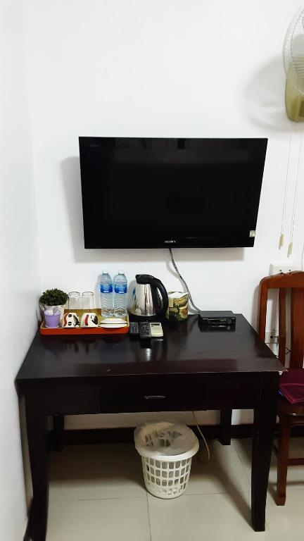 Příslušenství pro přípravu čaje a kávy v ubytování Kohkaew Village 2@Kohsamet