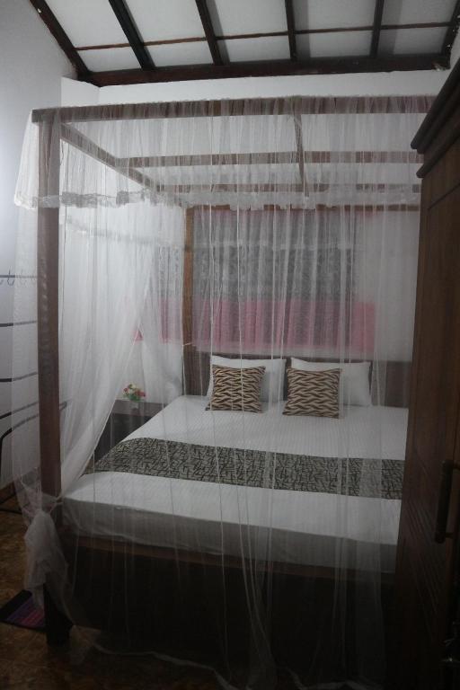 Postel nebo postele na pokoji v ubytování Dream Forest Rest