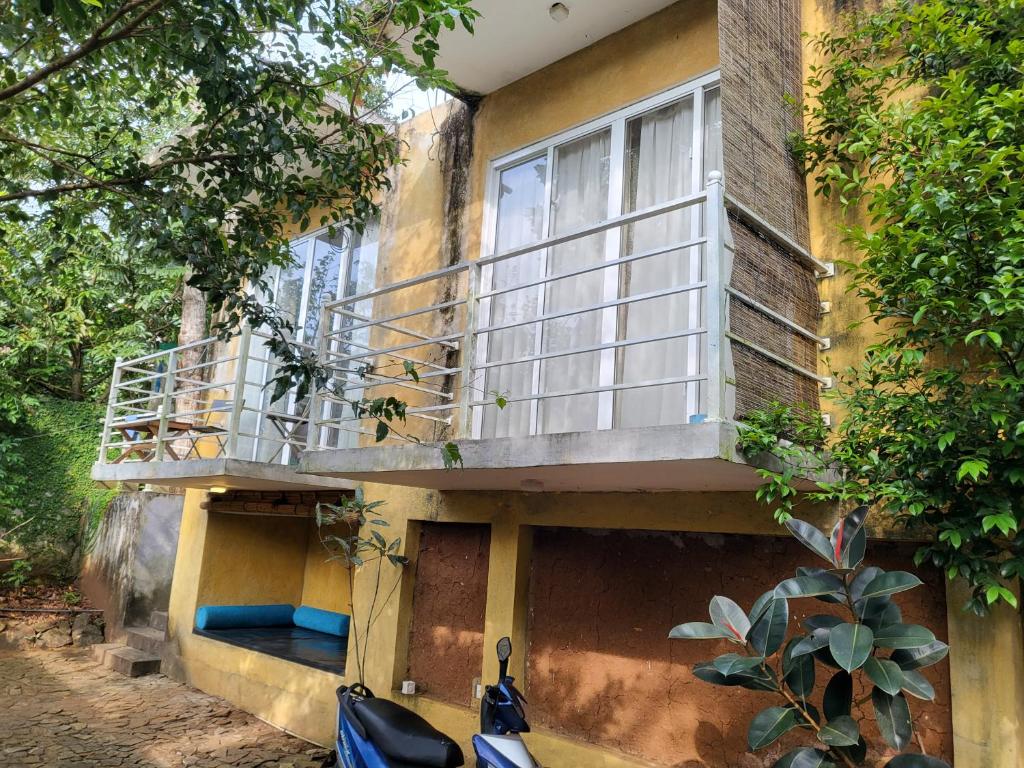 Balkón nebo terasa v ubytování Hasthi homestay