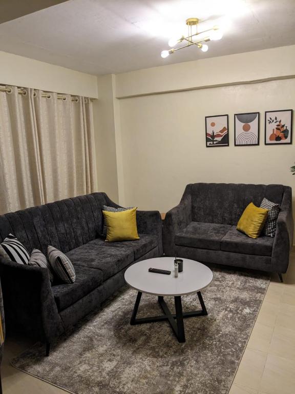 Posezení v ubytování Rawin Homes