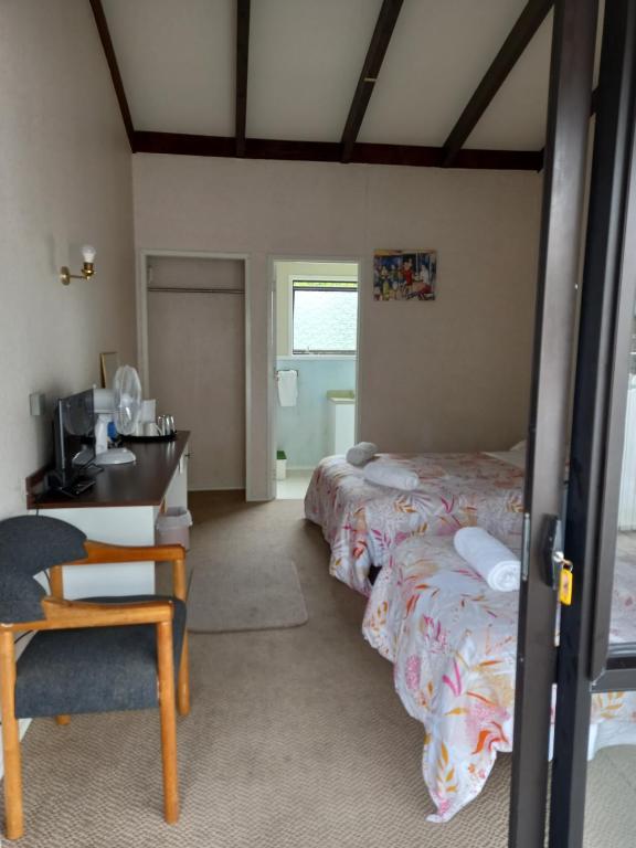 Postel nebo postele na pokoji v ubytování Pinelodge
