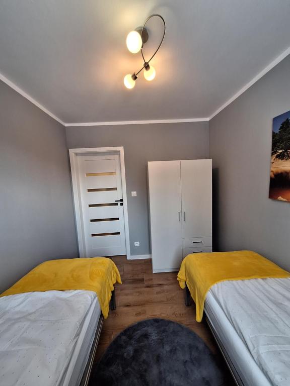 Posteľ alebo postele v izbe v ubytovaní SUNNY HILL , KOWARY