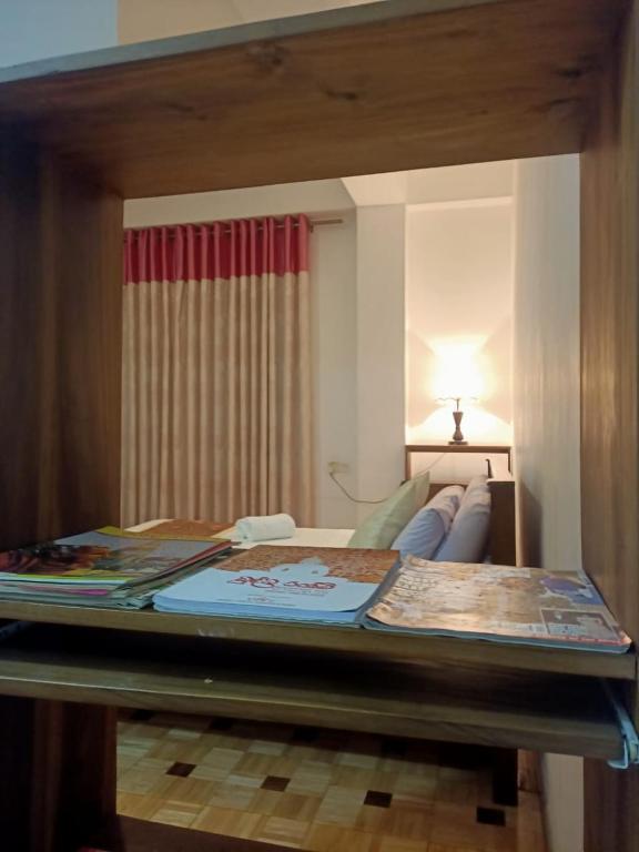 Postel nebo postele na pokoji v ubytování Tenshin Residance.