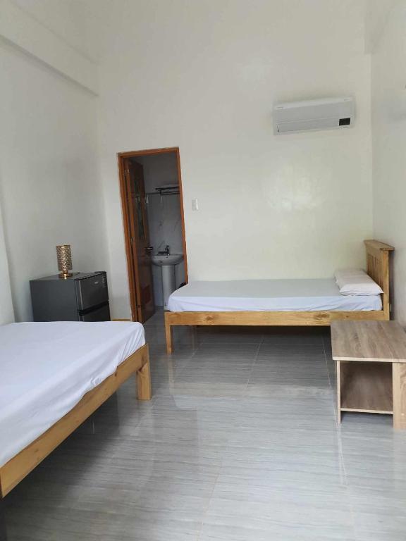 Postel nebo postele na pokoji v ubytování Chery's Guesthouse