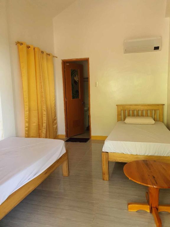 Postel nebo postele na pokoji v ubytování Chery's Guesthouse