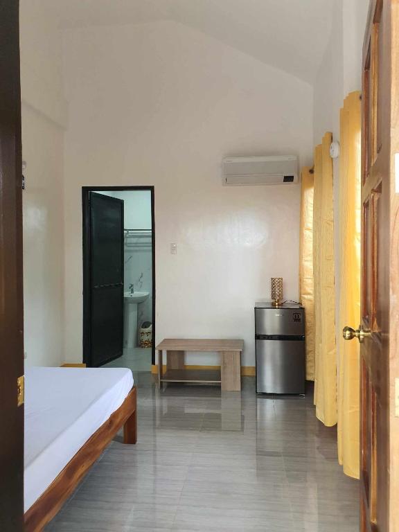 Postel nebo postele na pokoji v ubytování Chery's Guesthouse