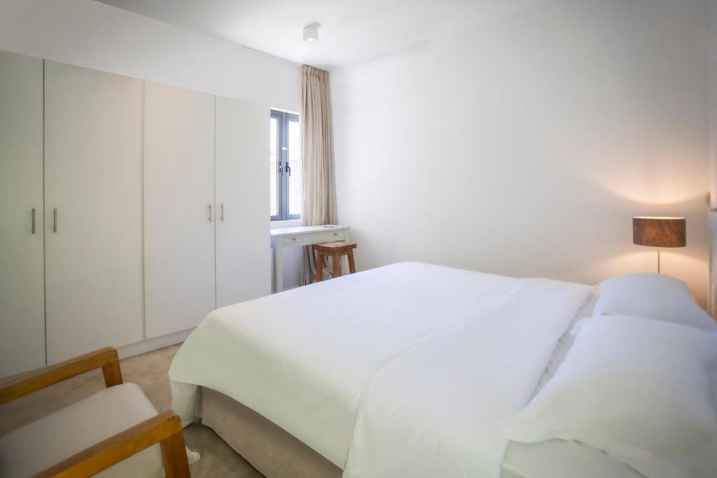 Postel nebo postele na pokoji v ubytování Beach Villa Poema