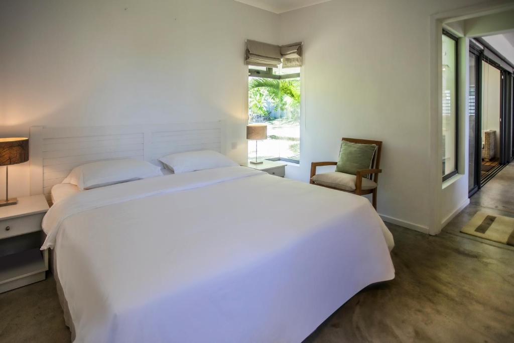 Postel nebo postele na pokoji v ubytování Beach Villa Poema