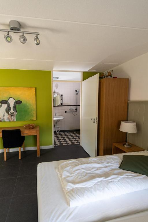 Postel nebo postele na pokoji v ubytování Hoeve Montigny B&B