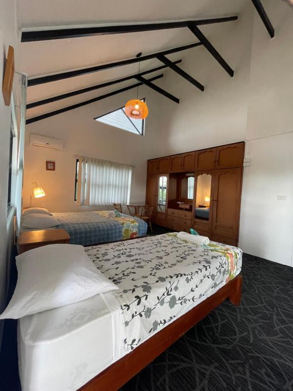Postel nebo postele na pokoji v ubytování Island Accommodation Suva Premier Hospitality