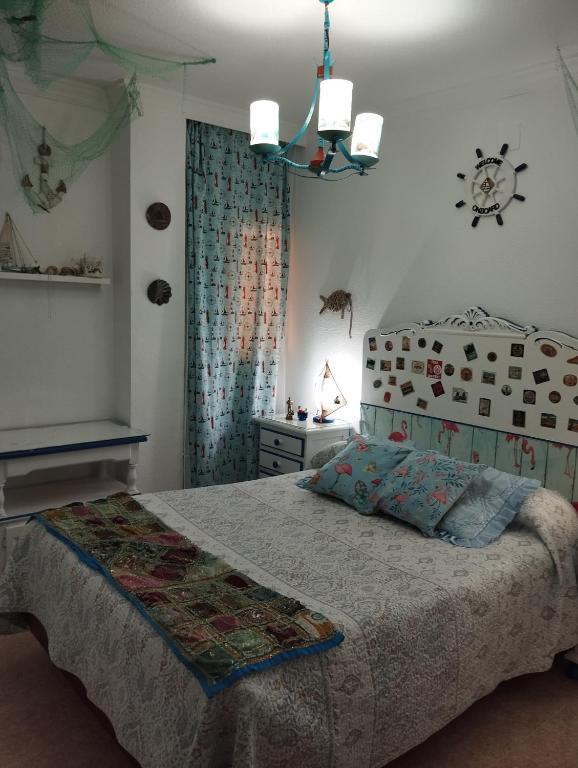 Postel nebo postele na pokoji v ubytování La Casa de La Abuela Rosy
