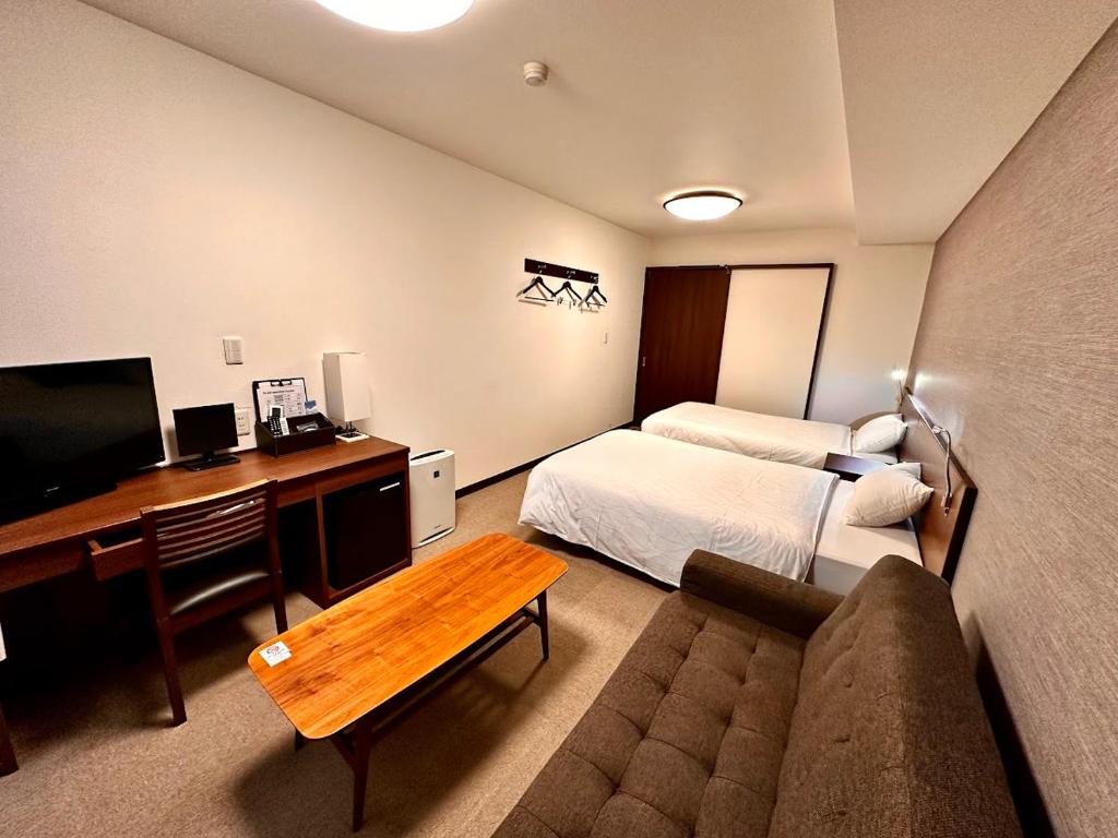 TV a/nebo společenská místnost v ubytování Hotel Togariishi