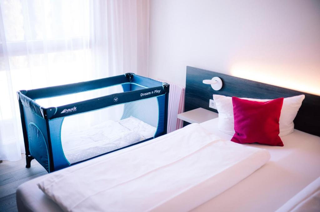 Postel nebo postele na pokoji v ubytování Hotel Calamus - 4 Sterne Superior