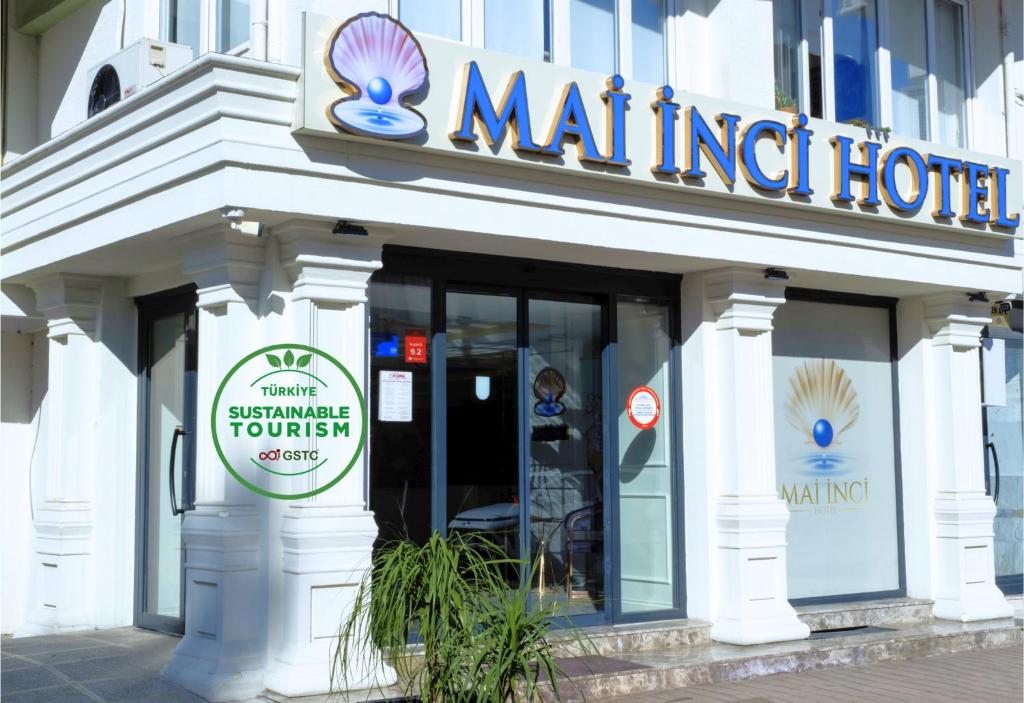 Mai İnci Otelに飾ってある許可証、賞状、看板またはその他の書類