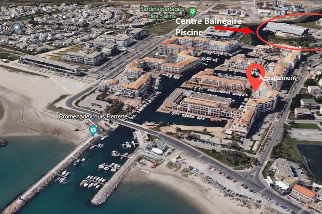 a map of a marina with a red arrow at Appart à 200m de la plage in Sète