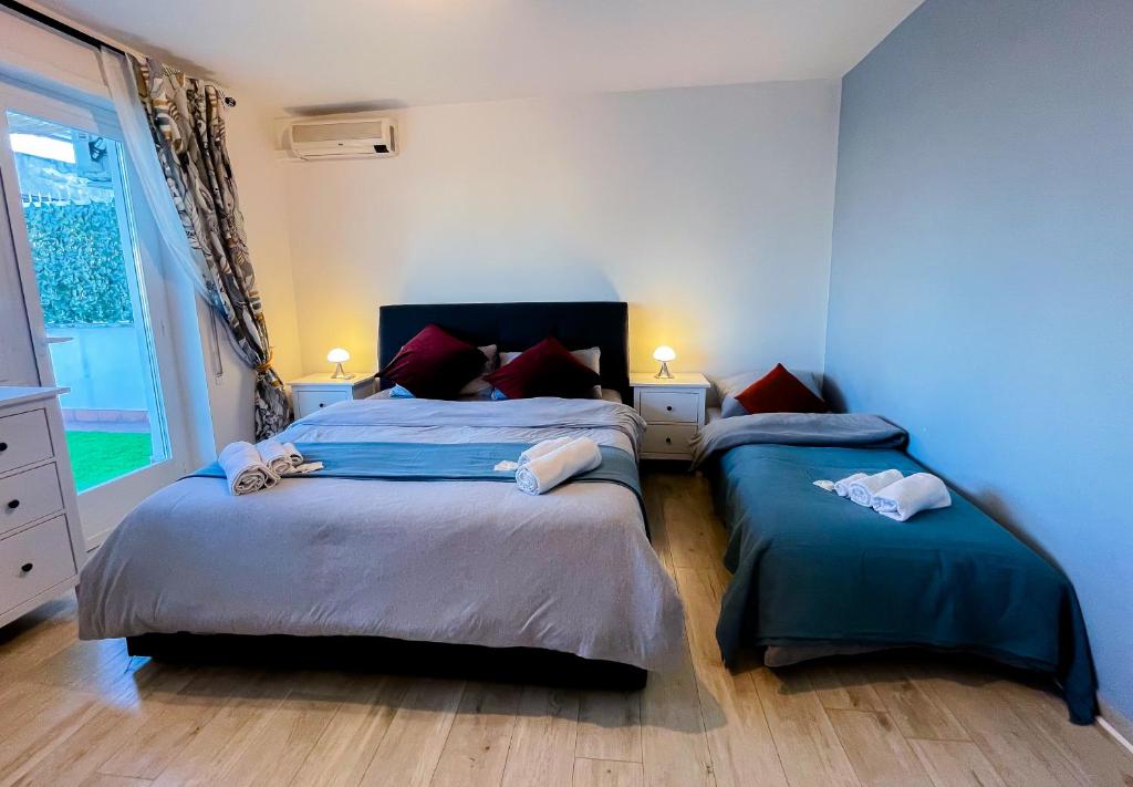 A bed or beds in a room at La Terrazza Imperiale