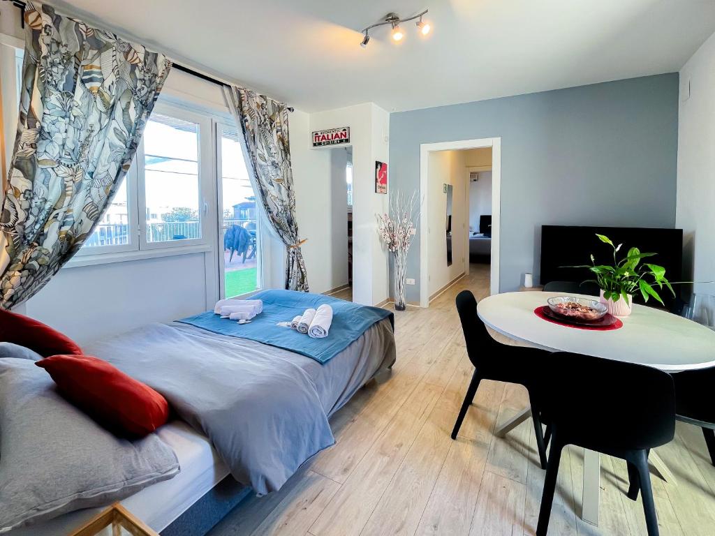 A bed or beds in a room at La Terrazza Imperiale