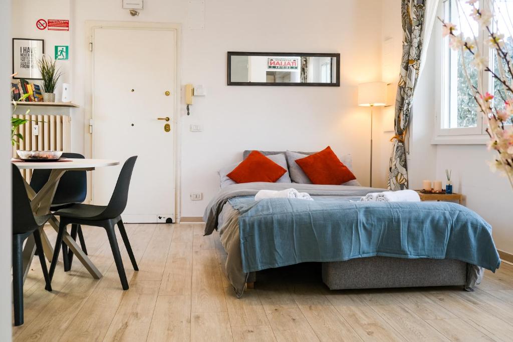 A bed or beds in a room at La Terrazza Imperiale