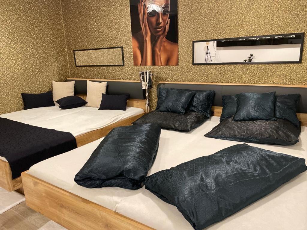 Postel nebo postele na pokoji v ubytování Escape Private SPA I