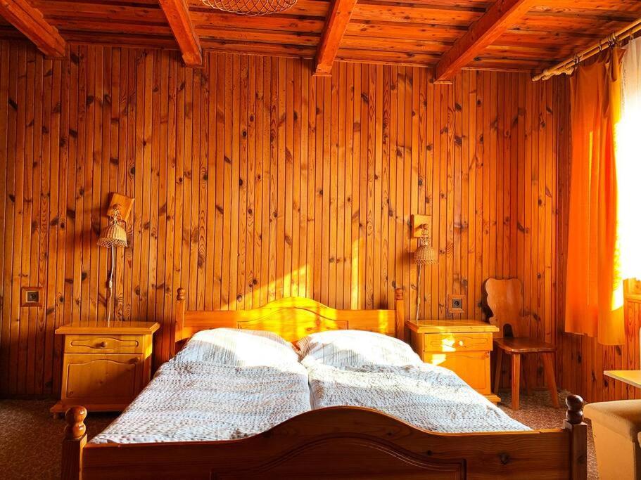 Posteľ alebo postele v izbe v ubytovaní Penzión Heľpa (do 25 hostí)