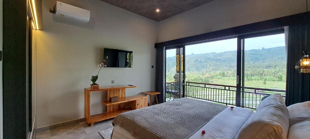 TV a/nebo společenská místnost v ubytování MAYURA BALI VILLA