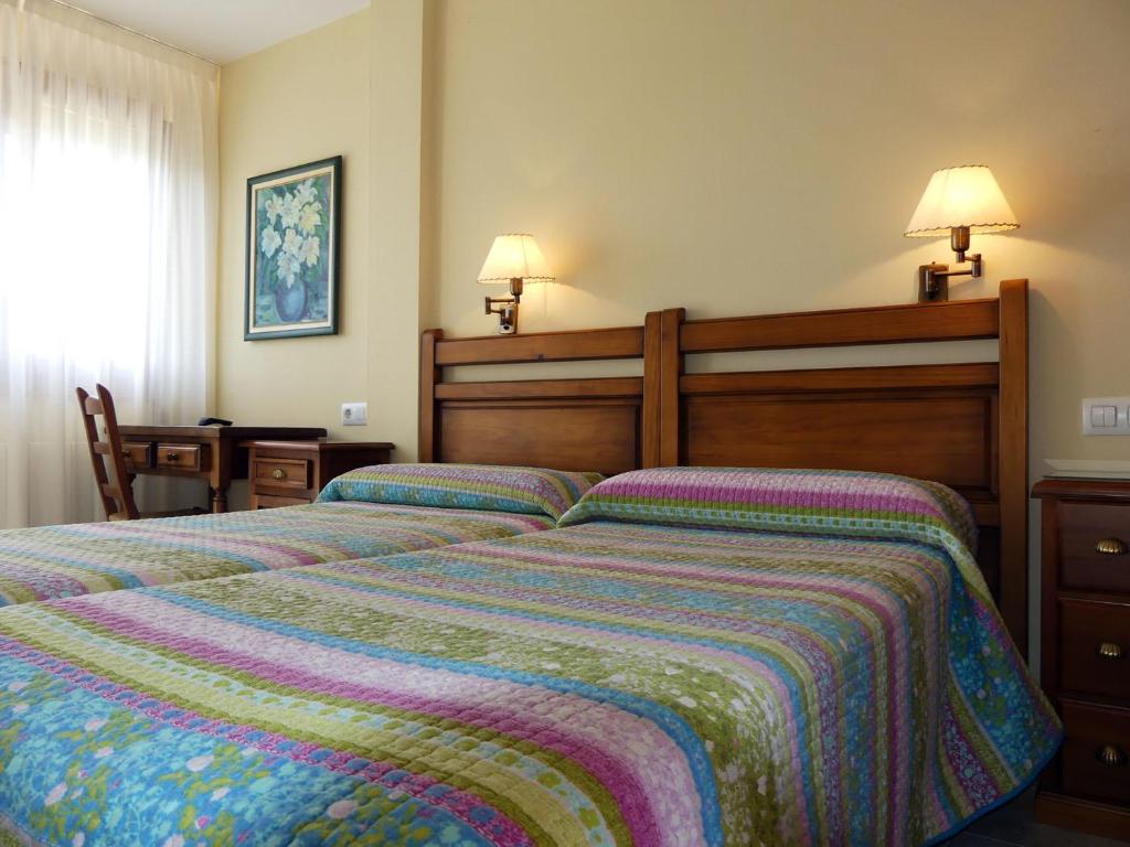 Posteľ alebo postele v izbe v ubytovaní El Mirador de Trasvia Comillas