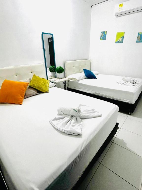 Postel nebo postele na pokoji v ubytování Riviera Central Hotel - Monteria