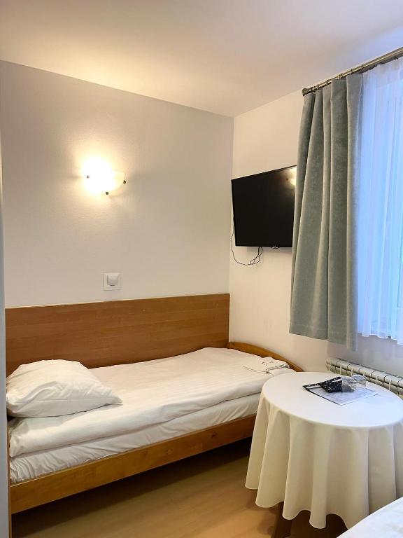 Łóżko lub łóżka w pokoju w obiekcie Motel Za Miedzą