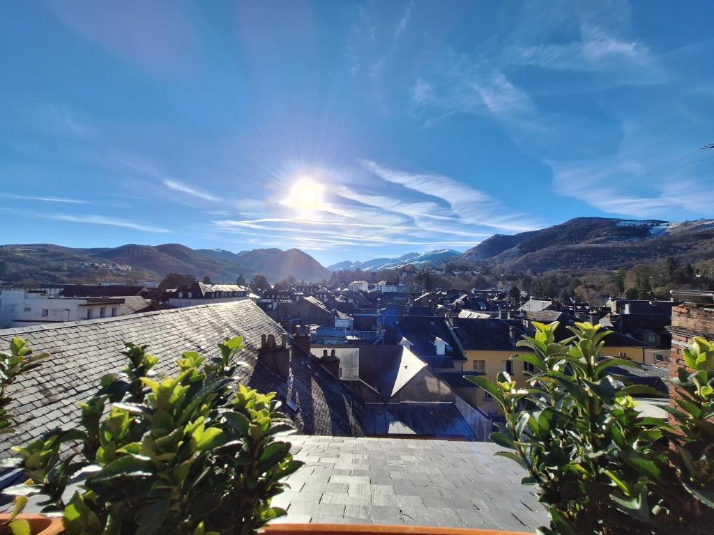 a view of a city from the roof of a building at Les Combles de Bagnères in Bagnères-de-Bigorre