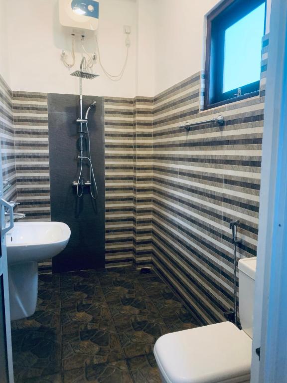 Koupelna v ubytování Center Point Villa Unawatuna