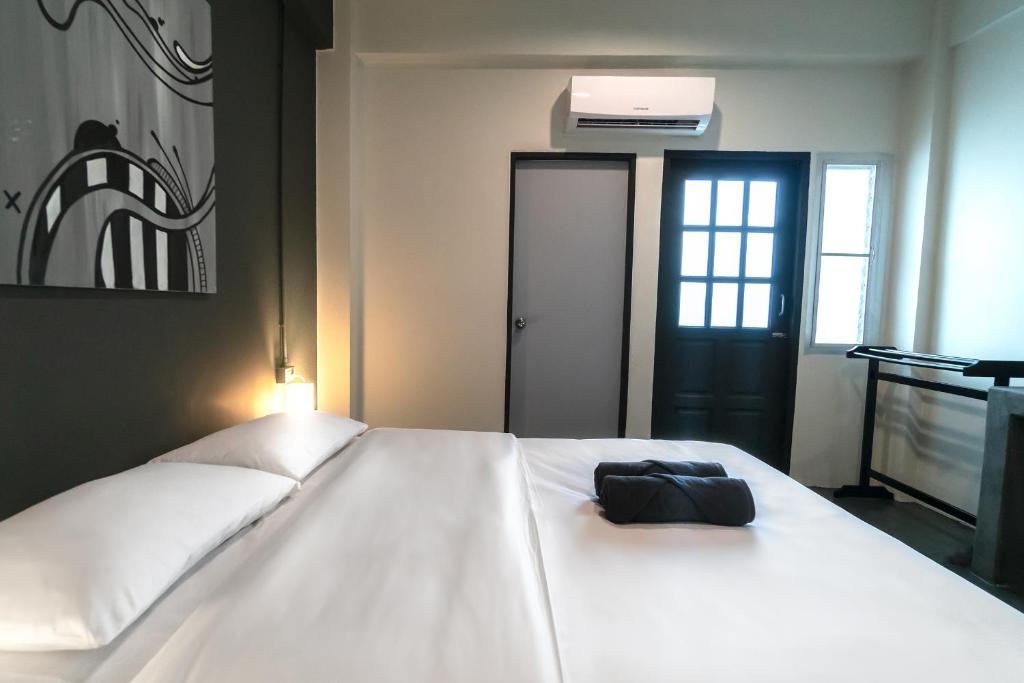Letto o letti in una camera di Sunrise Koh Tao