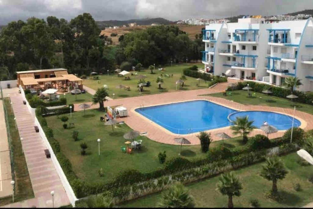 Bazén v ubytování Appartement Complexe Riviera Beach Cabo Airport Piscine Plage WiFi Parking Security nebo v jeho okolí