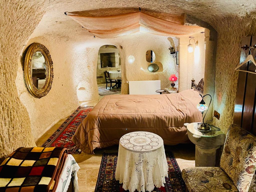 Postel nebo postele na pokoji v ubytování Sofa Hotel