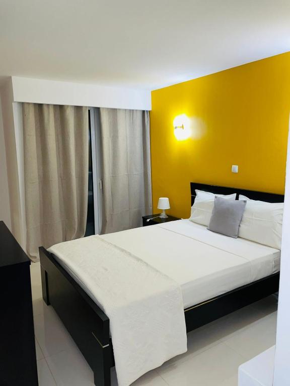 Postel nebo postele na pokoji v ubytování Residencial Sol Point Art