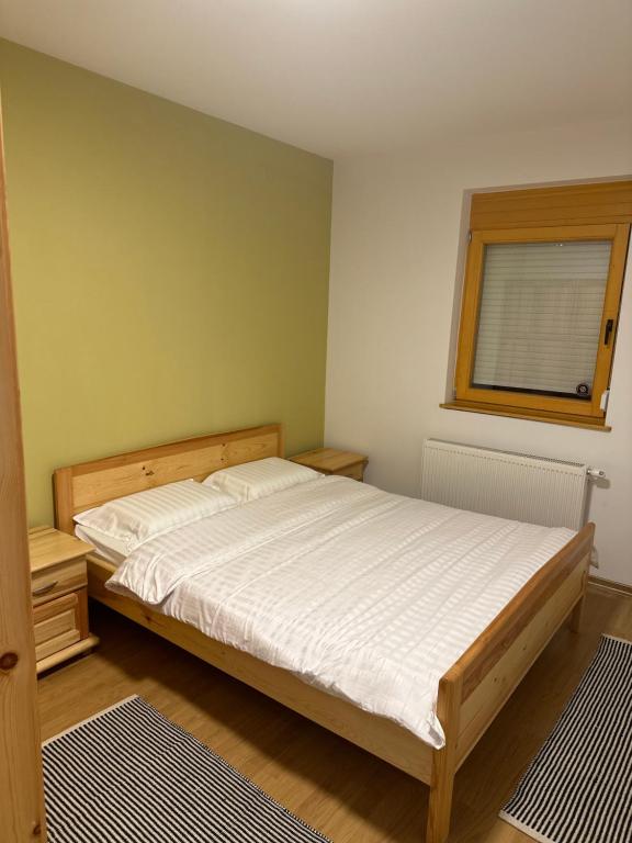 Postel nebo postele na pokoji v ubytování Apartman Hedonija Jahorina