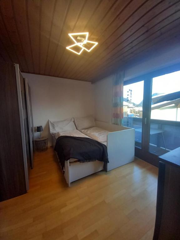Postel nebo postele na pokoji v ubytování Mani‘s Appartements
